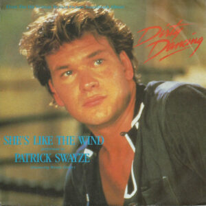 Single - Patrick Swayze Featuring Wendy Fraser - She's Like The Wind